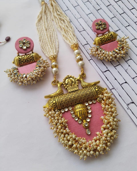 Baby pink traditional designer fabric necklace with earrings set in pink and golden