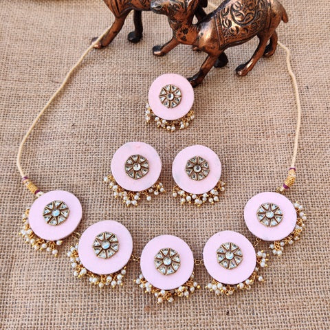 Baby pink choker necklace with round pendants and matching earrings with white beads