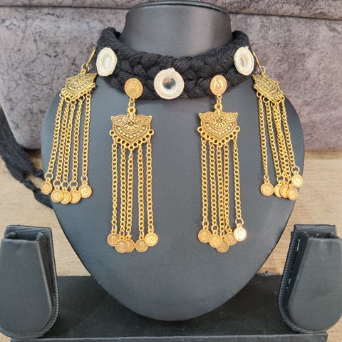 Black choker necklace with golden chains, charms and coins 