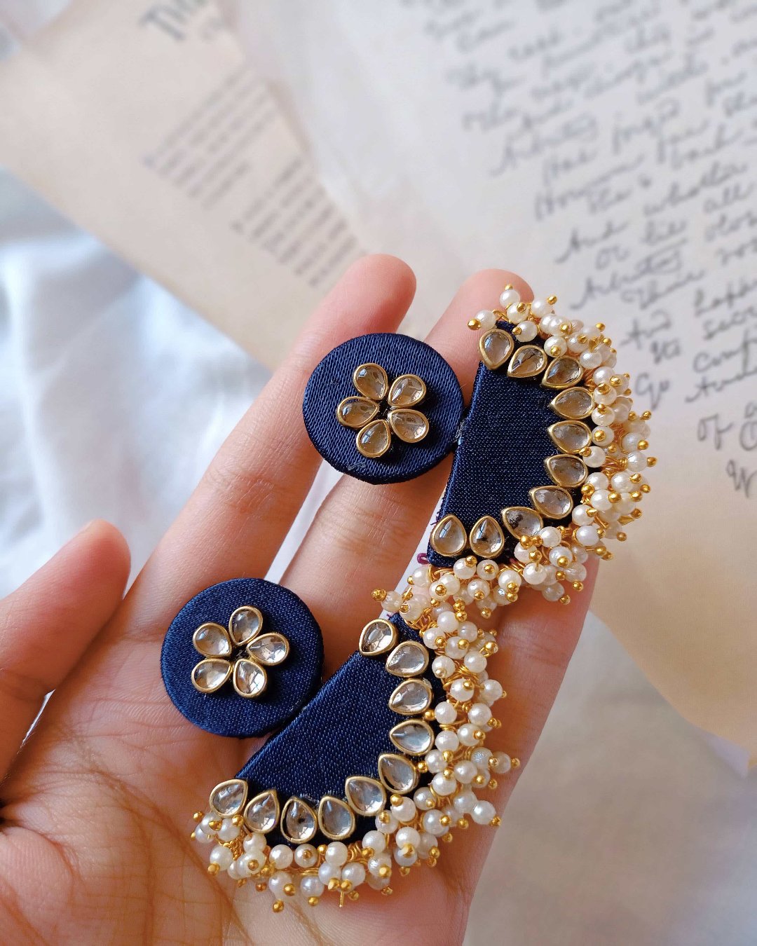 Blue semi circular beaded earrings