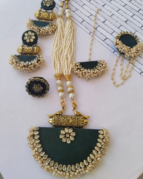 Bottle green traditional fabric necklace with kundan and white beads border and earrings