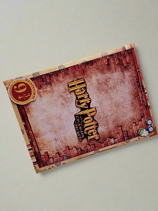 Chamber of the secrets theme harry potter personalized scrapbook layouts on white backdrop