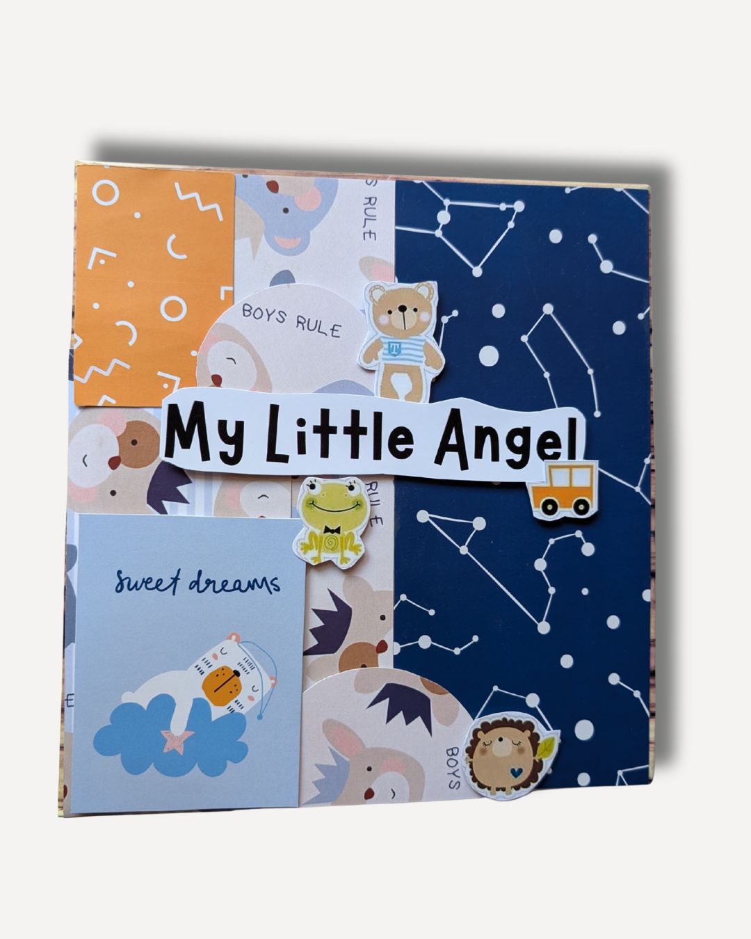Children's book with cartoon characters and 'My Little Angel' text on a white background