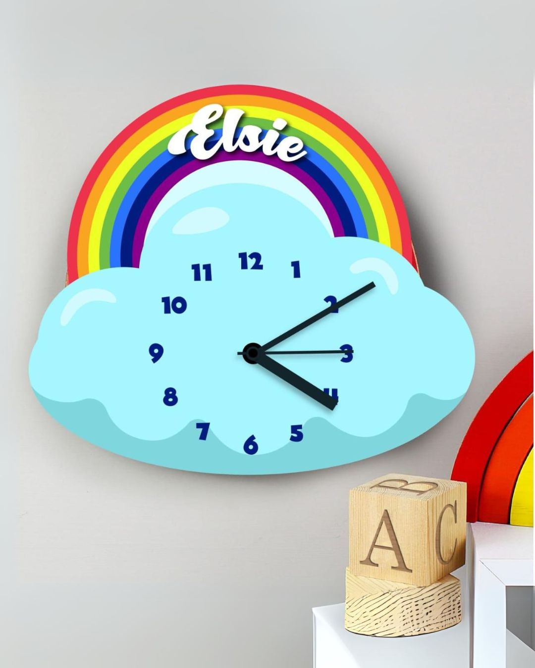 customized cloud and rainbow clock for  kids on a wall