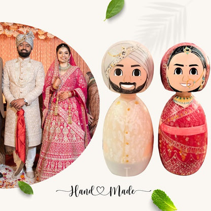 Miniature wooden peg zoobe dolls of a bride and groom with reference image on the left