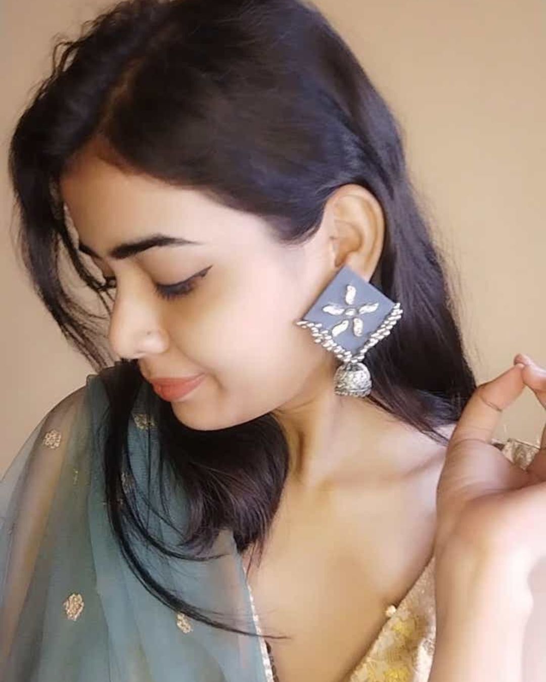 Dusky blue and kundan jhumka