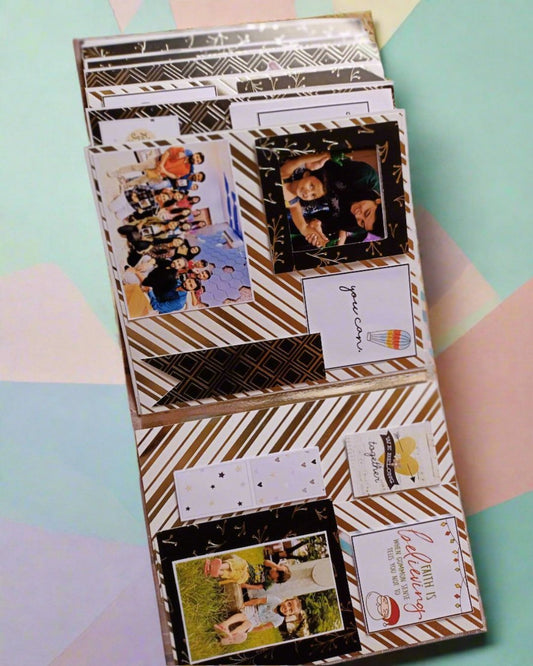 Black and silver customized scrapbook with happy pictures on a colorful backdrop