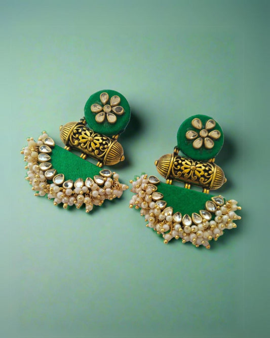 Green kundan earrings