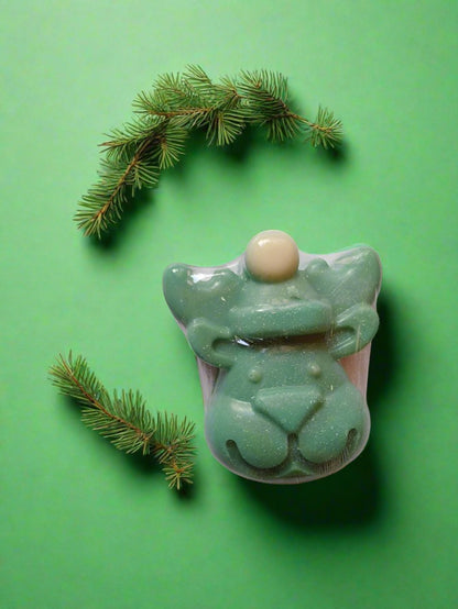 Green reindeer shaped soap bar on white backdrop