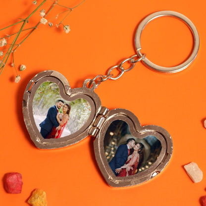 Heart shape photo keychain with happy couple's photos on both side on an orange backdrop