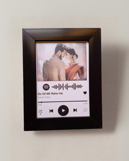 Black Spotify music frame customised with name and message