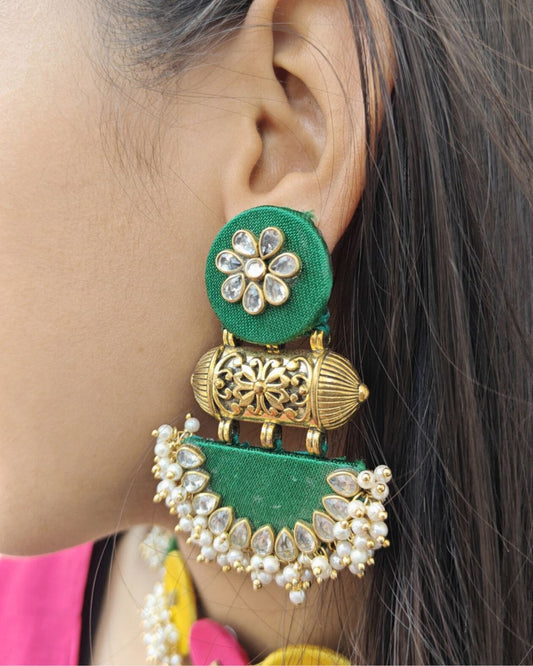 Green kundan earrings