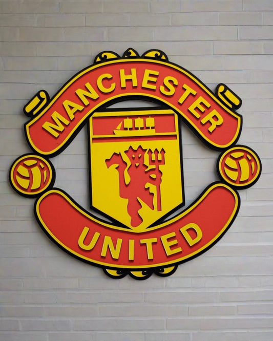 Manchester United red and yellow wall art on grey backdrop