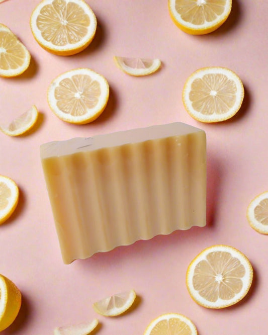  Orange rectangular soap bar on white grey backdrop