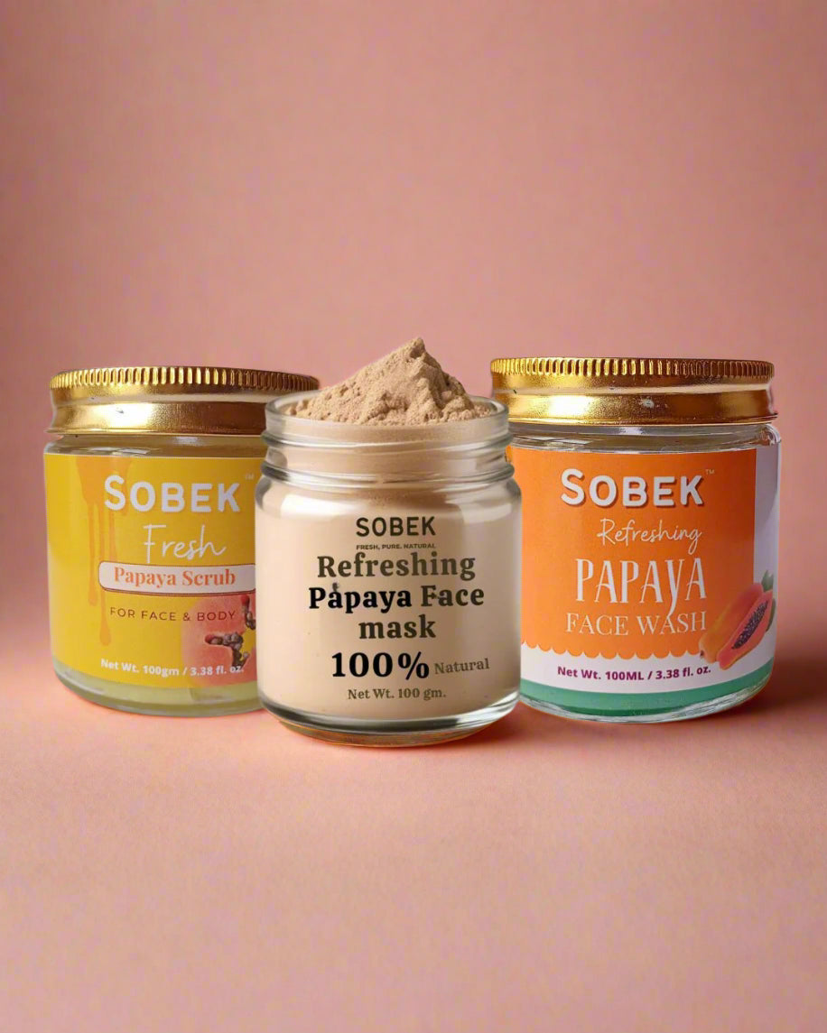 Sobek papaya skincare combo on pink backdrop in glass jars