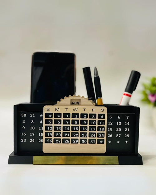 Black pen stand with infinite calendar, mobile in mobile stand and pens inside