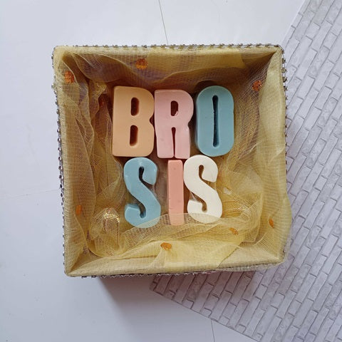 Bro Sis alphabets soaps inside a golden organza box 
