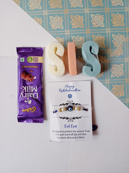 Sis alphabets soaps in pink and blue with dairy milk chocolate and evil eye rakhi