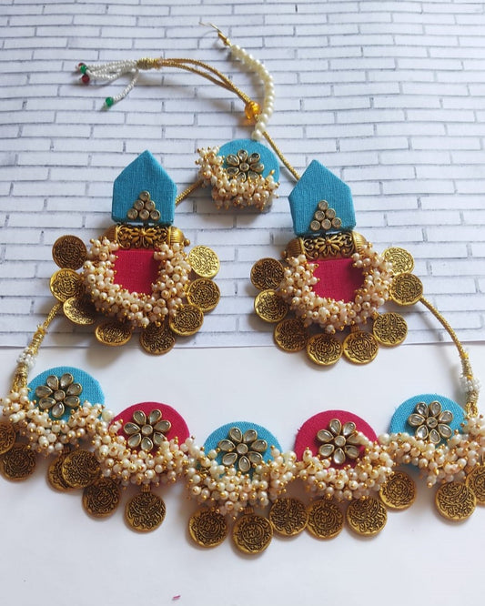 Pink and blue necklace and earrings with white beads, golden coins and white kundan