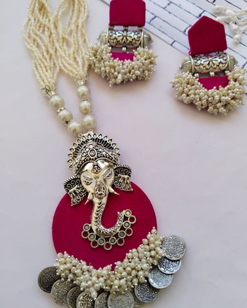 Dark pink fabric necklace and earrings set with silver coins ganpati and white beads 