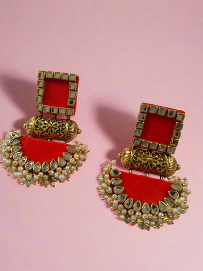 Bright red earrings with golden tabiz, white and golden beads and kundan