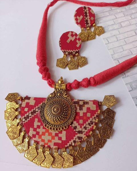 Bandhani patola print red necklace with golden charms and earrings