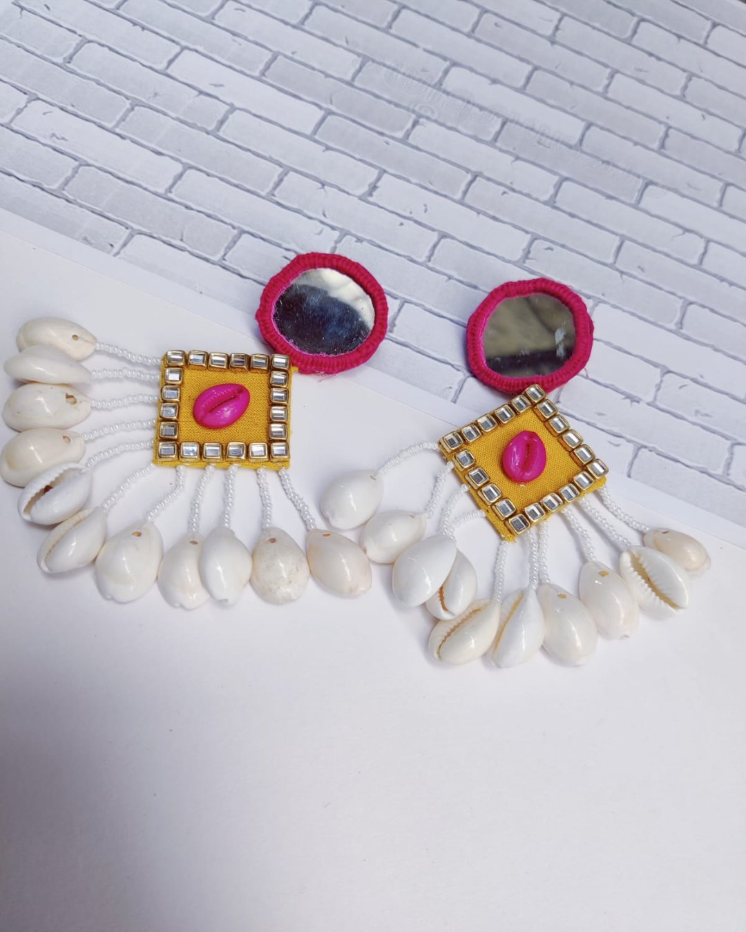Round and kite shape earrings in yellow, white and pink sea shells latkan