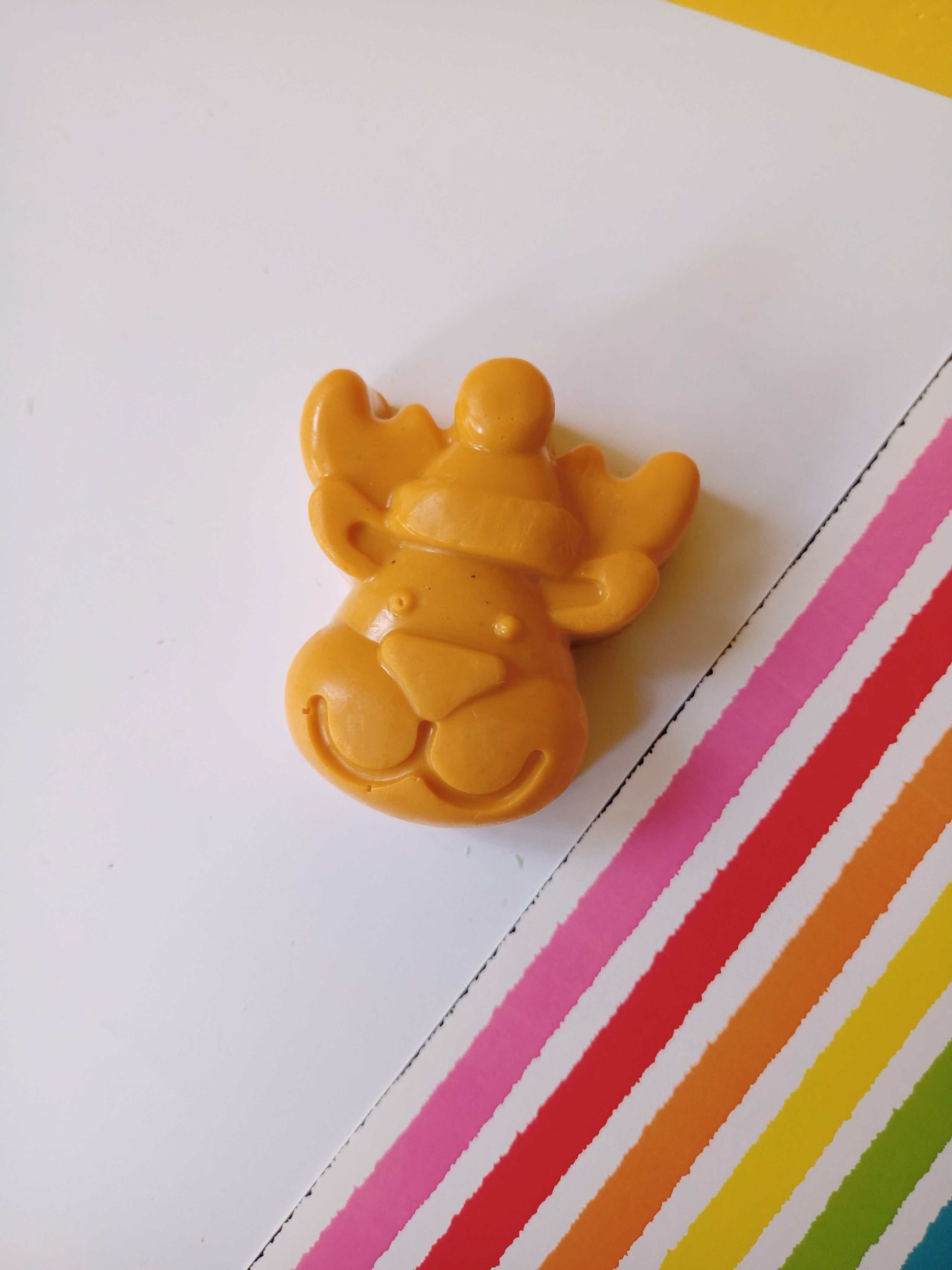 Reindeer shaped orange soap with multicolor base