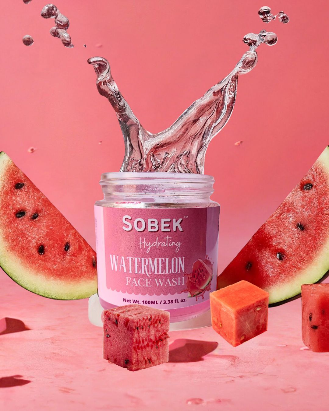 Sobek naturals watermelon face wash on pink backdrop with watermelon slices around