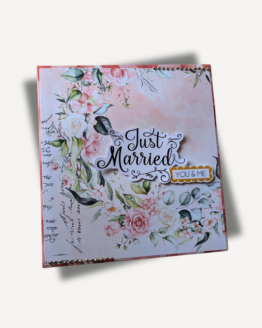 Card with floral design and 'Just Married' text on a white background