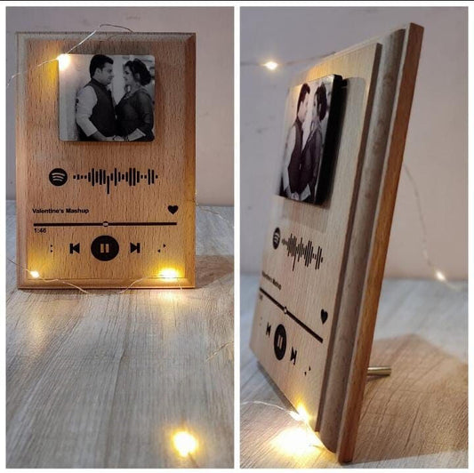 Wooden frame with couple photo, spotify link engraved and LED lights around