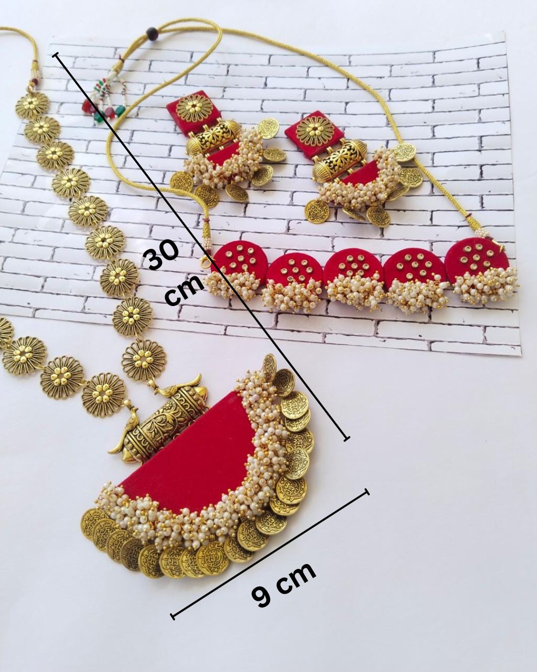 Rainvas Red necklace choker earrings set with kundan and golden pearls beads