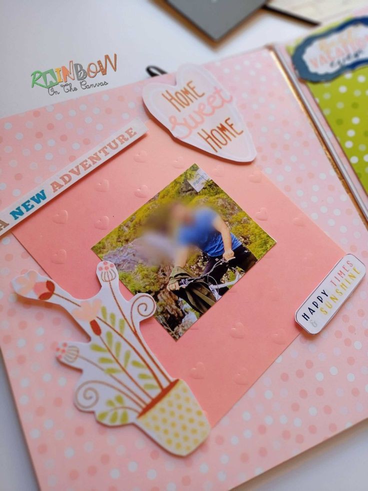 Colorful birthday scrapbook with photos on a white backdrop