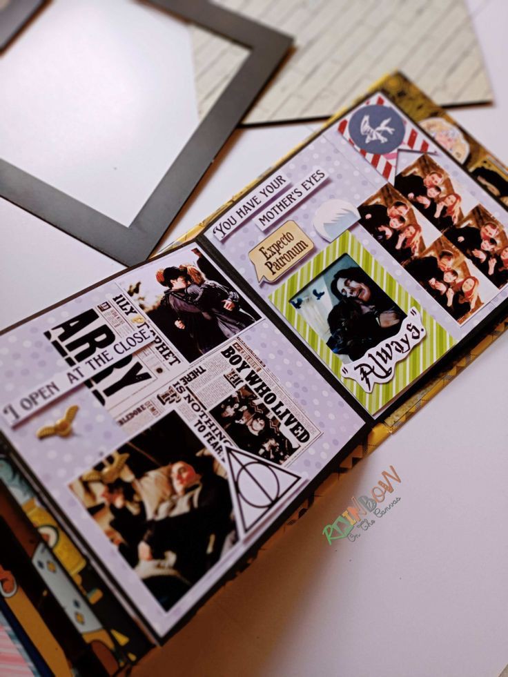 Hogwarts harry potter theme scrapbook with pictures on white backdrop