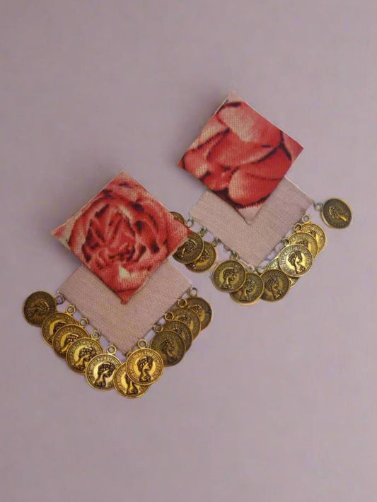 Pink rose printed earrings with golden coins on white grey backdrop