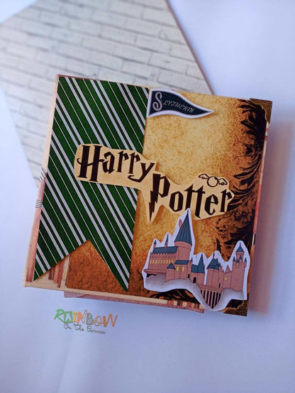Slytherin house theme Harry Potter customized scrapbook on white backdrop